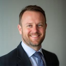 Professional portrait of Conor Doyle, a meticulous legal and HR compliance specialist.